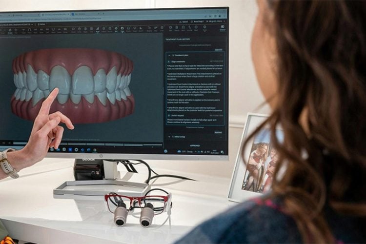 Patient smiling after orthodontic treatment showing the health and confidence benefits